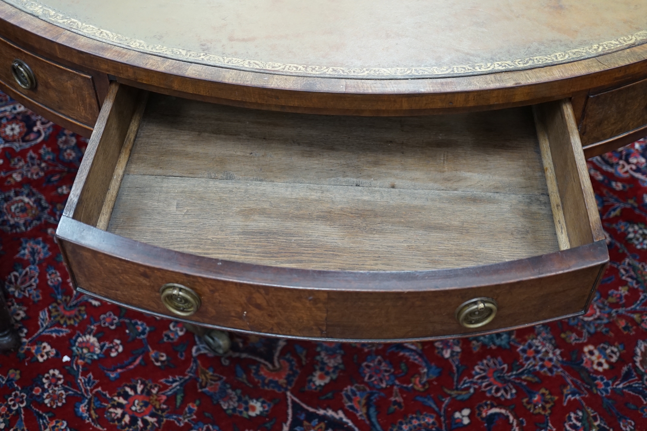 A Regency and later circular mahogany drum table, diameter 136cm, height 74cm